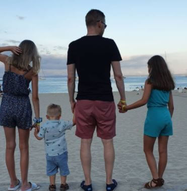 Mark Goldbridge with his three children.